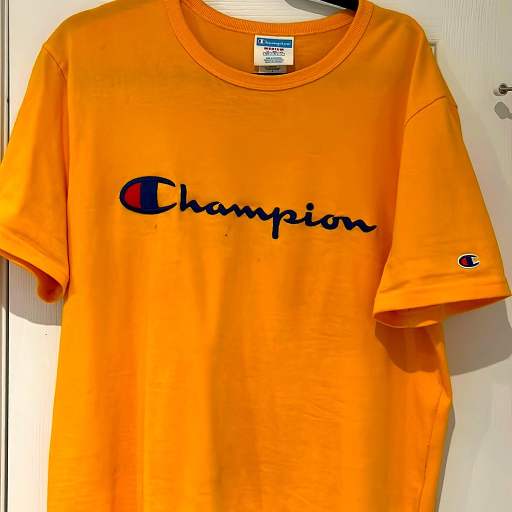 Gold Champion medium size shirt